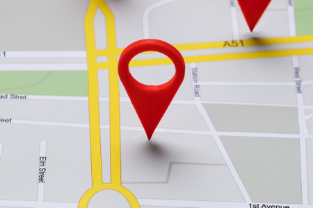 Close-up Of A Road Map With Red Navigation Iconsの写真素材