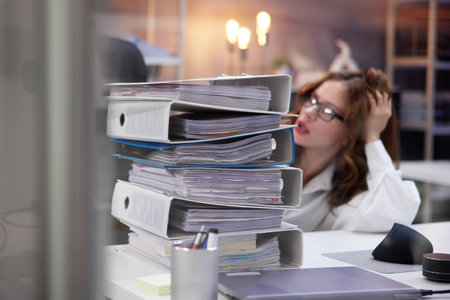 Overworked Business Woman With Stack Or Pile Of Folders