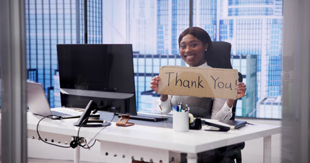 Thank You for Holding Up the Corporate Sign: Appreciating Youの写真素材