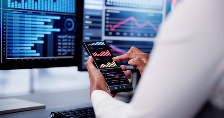 African Advisor Using KPI Dashboard With Financial Analytics Graphsの写真素材