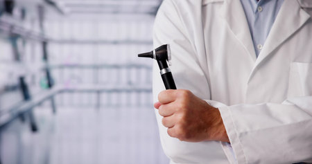 Audiology Hearing Care Medical Doctor With Otoscopeの写真素材