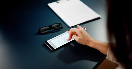 Signing Apartment Rental Contract Paper With Digital Signature
