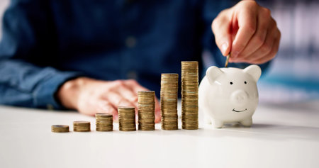 Piggybank Money And Support Hand. Coin In Piggy Bank