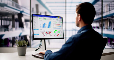 KPI Business Analytics Data Dashboard. Analyst Using Computer Caucasian