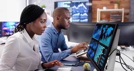 African financial analyst manager analyzing data on dashboard