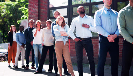 Queue Outdoors. Business People Waiting In Line