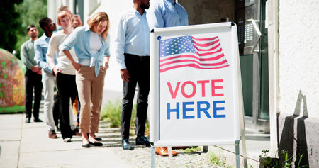 Diverse People At Voting Booth. Vote Here Elections Sign