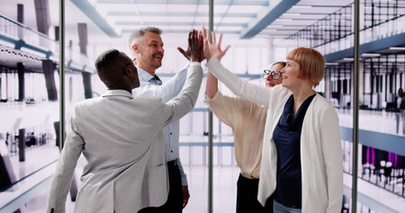 Motivational Business Meeting At Workplace. African Hands Giving High Five