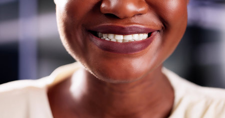 Successful African American woman assisting a customer as a contact center operator during a sales...