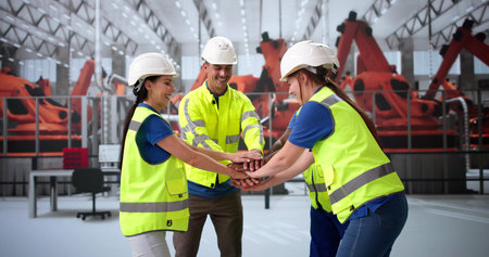 Team Spirit And Cohesion At Car Factory. Supporting Handsの写真素材