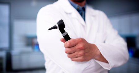 Audiology Hearing Care Medical Doctor With Otoscopeの写真素材