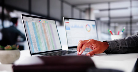 African American Business Data Analyst Using Analytics Softwareの写真素材