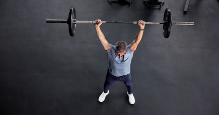 Weight Training Workout In Gym. Gym Doing Push Press