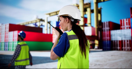 Container Port Foreman Talking To Crane Operatorの写真素材