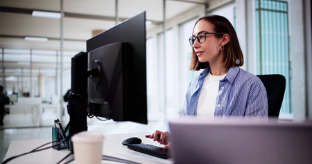 Business Woman Using PC Computer In Office