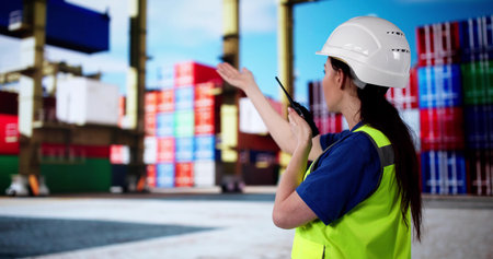 Container Port Foreman Talking To Crane Operatorの写真素材