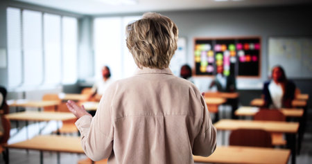 Professor Teacher Classroom Teaching Students. Education And Technologyの写真素材