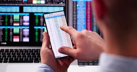 Spreadsheet Data Analyst Using Computer Software On Phone