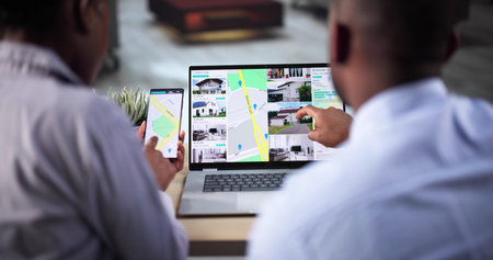 Couple Family Searching Real Estate Property Or House Onlineの写真素材