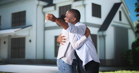 Couple In Front Of New House With Solar Panel Roofの写真素材