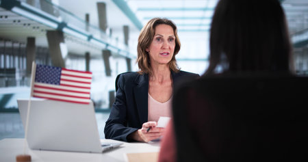 African-American lawyer helps woman secure USA immigration visa approvalの写真素材