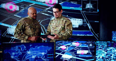 Young African American man at Army Technology Center using computer.