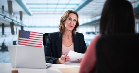 African lawyer assists older woman with US immigration application approval.の写真素材