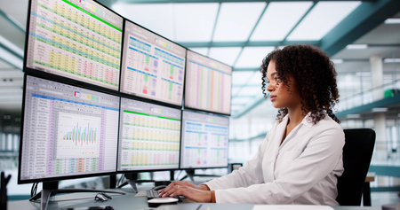 Hospital Doctor Using Spreadsheet For Billing Codes On Desktop