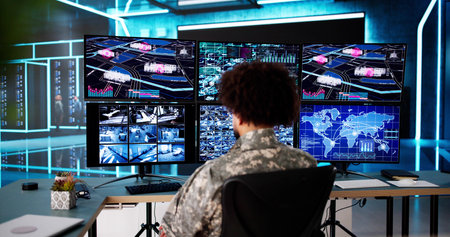 Air Reconnaissance Technology On Computer: Man Monitoring Security Cameras Worldwide.