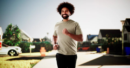Athlete sprints confidently through city streets during morning workout.