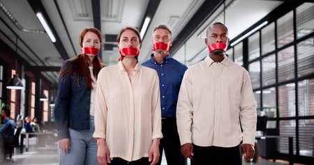 Silent Business Team With Tape Over Mouths