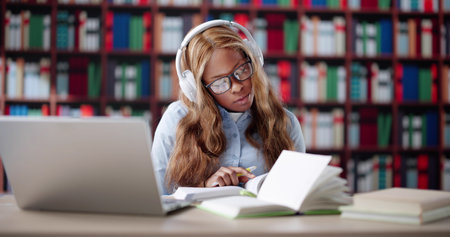 Focused College Student Studying Online With Laptop At University School.
