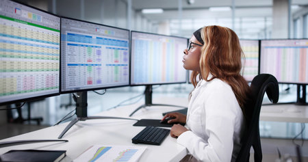 Doctor Codes Medical Bills On Hospital Spreadsheet For Accounting Audit.