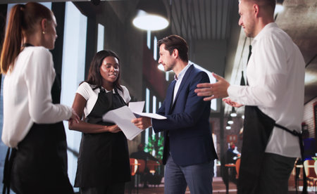 Frustrated Restaurant Boss Arguing With Diverse Team In Coffee Shop.