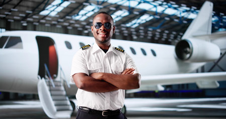 Smiling African American Man In Aviation Uniform Boarding Private Jet.