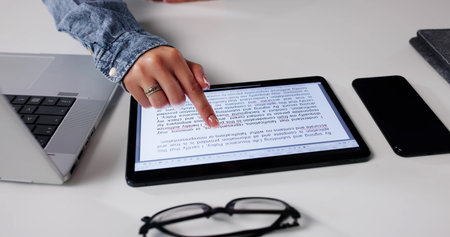 Close Up Of Woman Reviewing Legal Business Contract Form Letterの写真素材