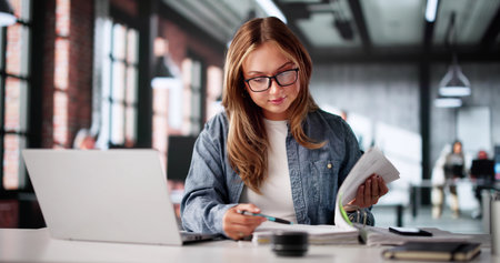 Accountant Working On Electronic Invoice Statement With Spreadsheet Calculation Online