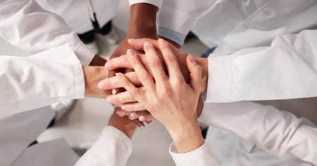 Healthcare Professionals Collaborating And Supporting Each Other In Hospital Setting.の写真素材