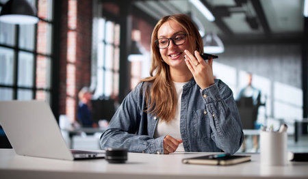 Happy Young Client Consulting With Female Businesswoman On Smartphone Call.の写真素材