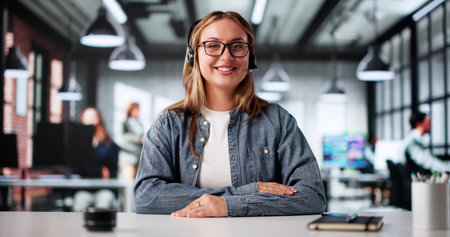Professional Woman Leading Virtual Office Meeting Using Headset And Computer