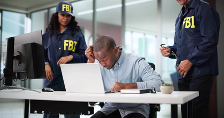 FBI Officers Arresting Man Convicted In Securities Fraud Investigation.の写真素材