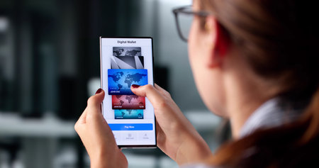 Woman Using Digital Payment Wallet To Make Online Financial Transactionsの写真素材
