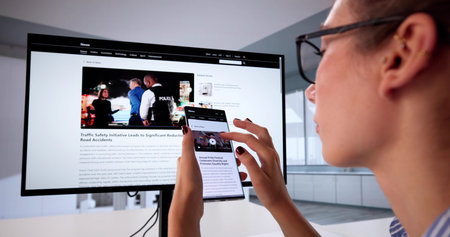 Journalist Reading Articles On Smartphone In Online Media Website.