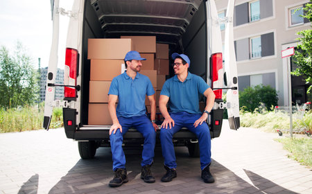 Hardworking Team Of Movers Delivering Efficient Furniture Moving Servicesの写真素材