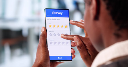 Smartphone Survey Analyst Collecting Customer Satisfaction Data From African American Woman
