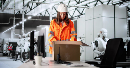 Unemployed Woman Using Computer At Semiconductor Production Factory Assembly Line.の写真素材