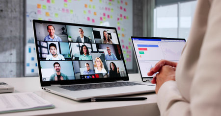 Female Executive Leading Virtual Business Meeting From Home Office Laptop