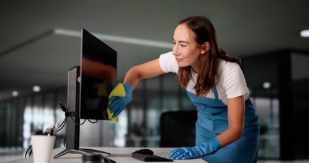 Efficient Office Cleaners Keep Workspaces Neat And Sanitary Everydayの写真素材