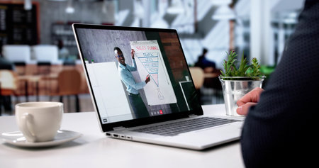 Virtual Meeting Trainer Helps Agile Man Learn Computer Language Onlineの写真素材