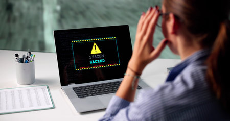Young Woman Works Diligently To Prevent Cyber Attacks On System.